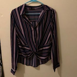 This is a multi colored button up in a U.S medium.